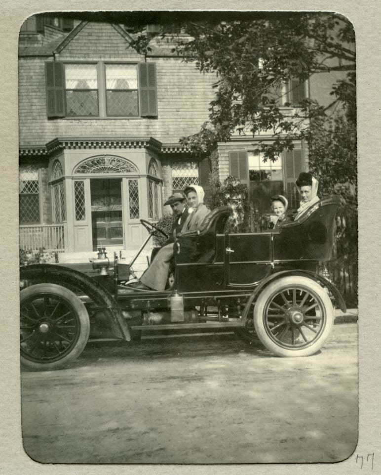 Group sitting in automobile, May 18, 1905
