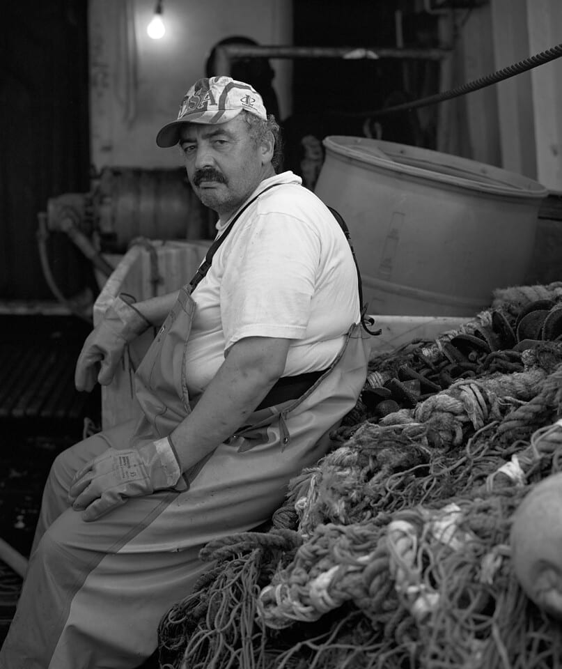 Cook on the Voyager
Accession Number: 2009.1.31
Creator: Phillip Mello
Summary: Armando, fisherman, cook, on the fishing vessel VOYAGER.
Date: 2008
Medium: TIFF, Digital