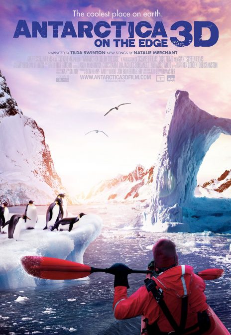 A movie poster for Antarctica on the Edge 3D. There is someone kayaking through the waters by a group of penguins. Snowy mountains tower over them; there are birds flying into the sunset. There is text that reads: "The coolest place on earth. Antarctica on the Edge 3D. Narrated by Tilda Swinton. New songs by Natalie Merchant."