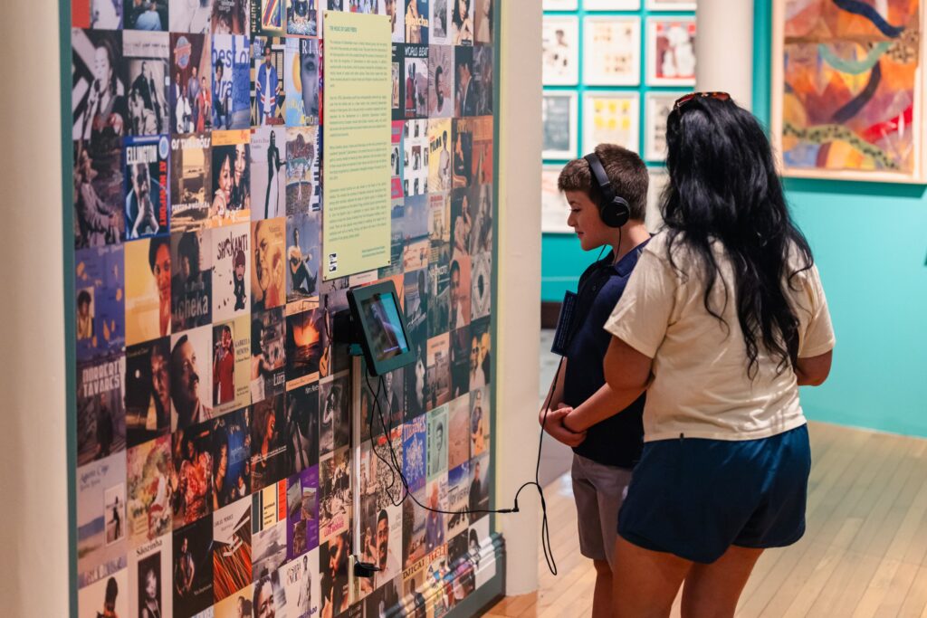 Adult and child looking at a display.