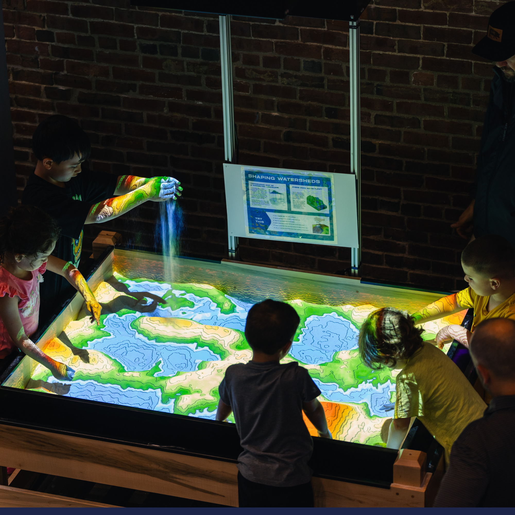 children at sand table
